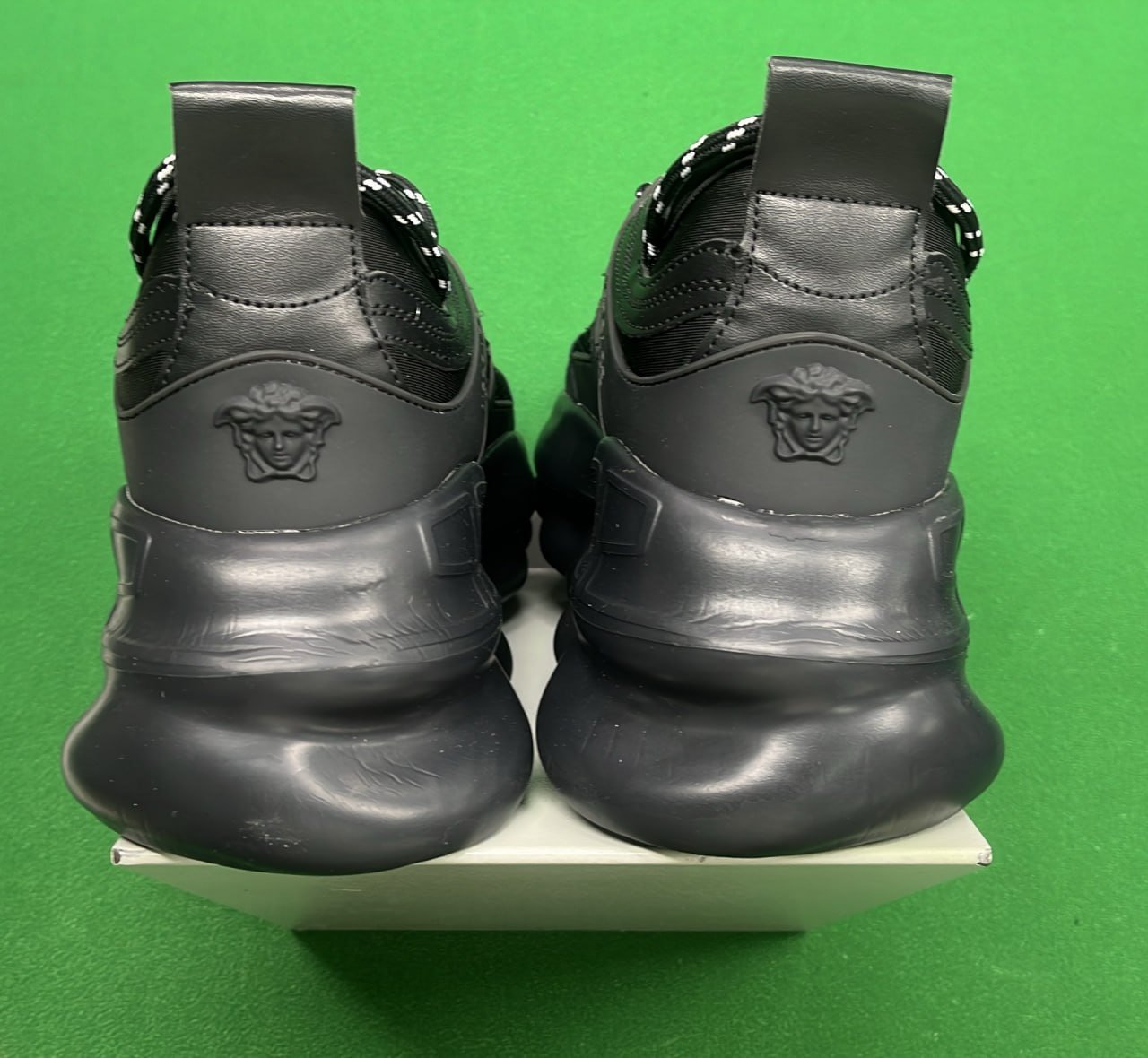 Versace chain reaction